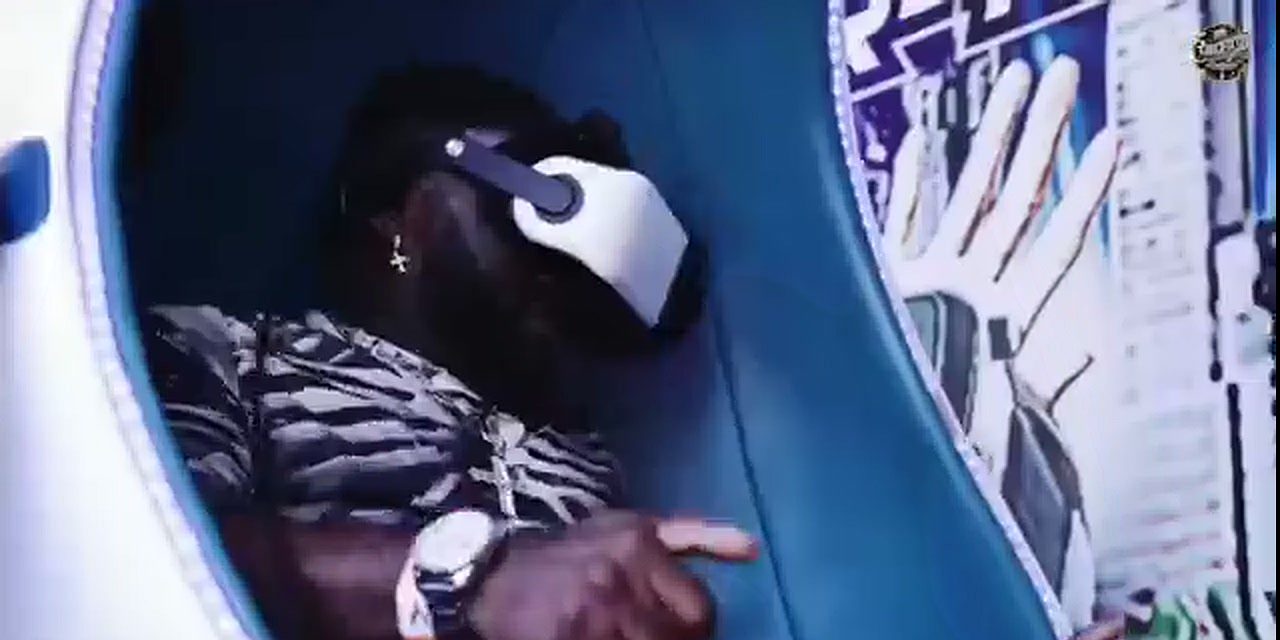 Don Crucifixto wearing a VR headset in an immersive pod