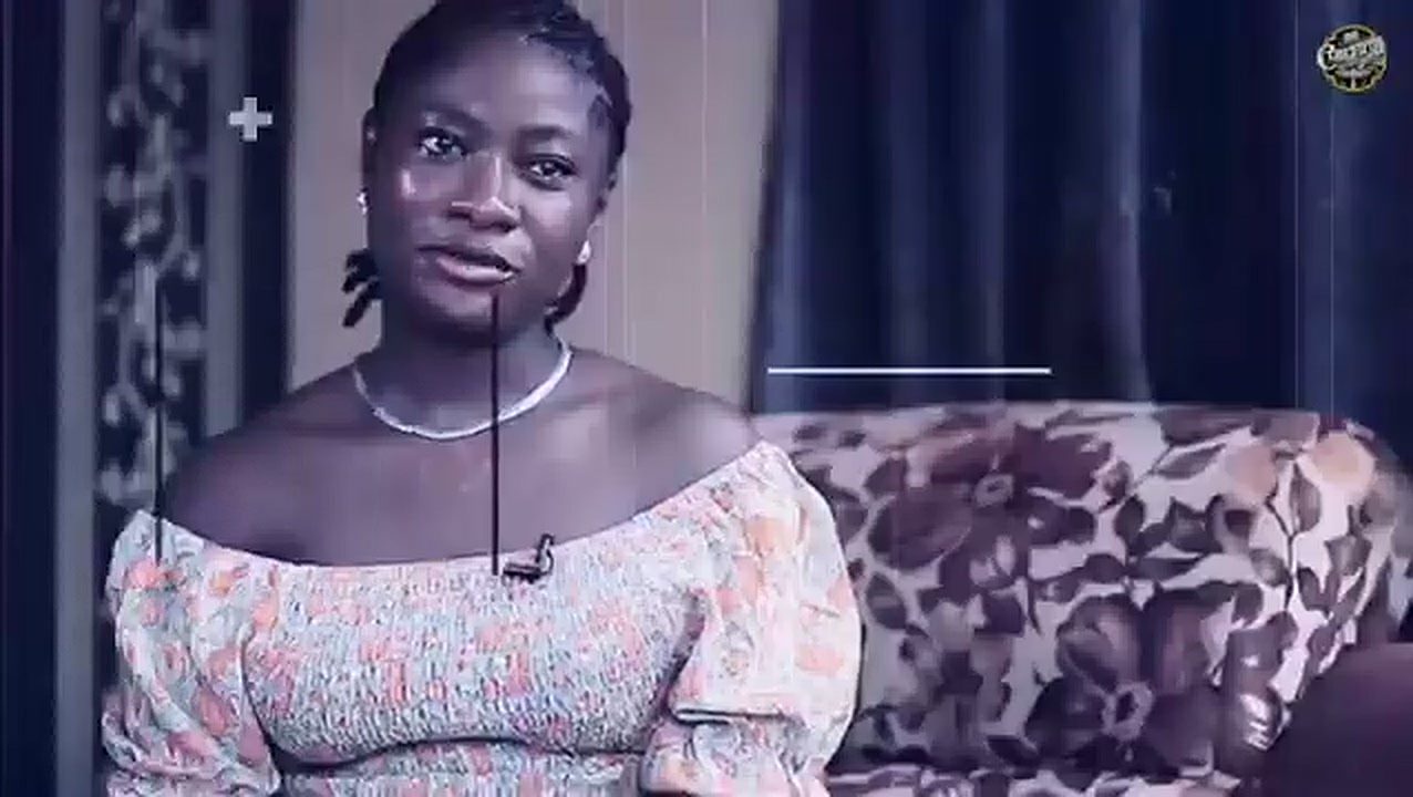 A young woman speaking to camera during a DC Chronicles interview